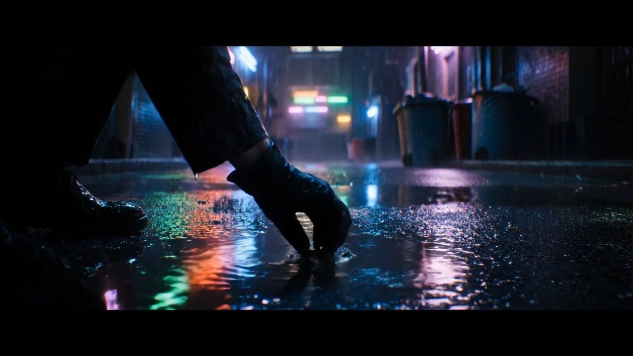 A rainy night, a narrow back alley lit by flickering neon signs.